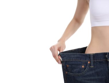 Concept of weight loss with slim girl, isolated on white background