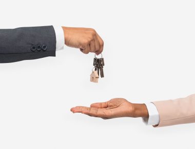 hand-giving-key-real-estate-agent-1fpaTiec